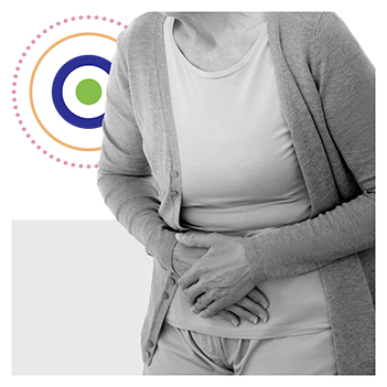 Woman with hands on side of stomach